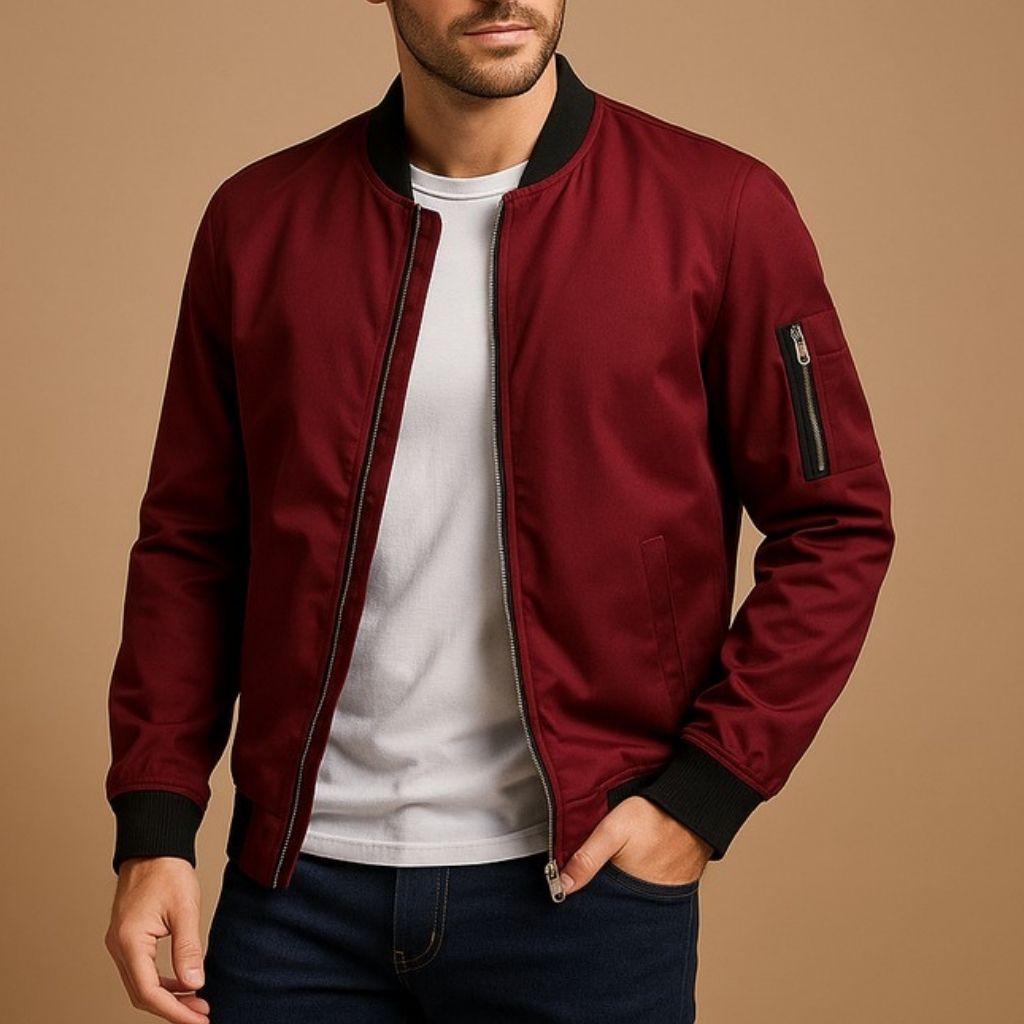 Bomber jacket rear view showing ribbed hem and structured fit
