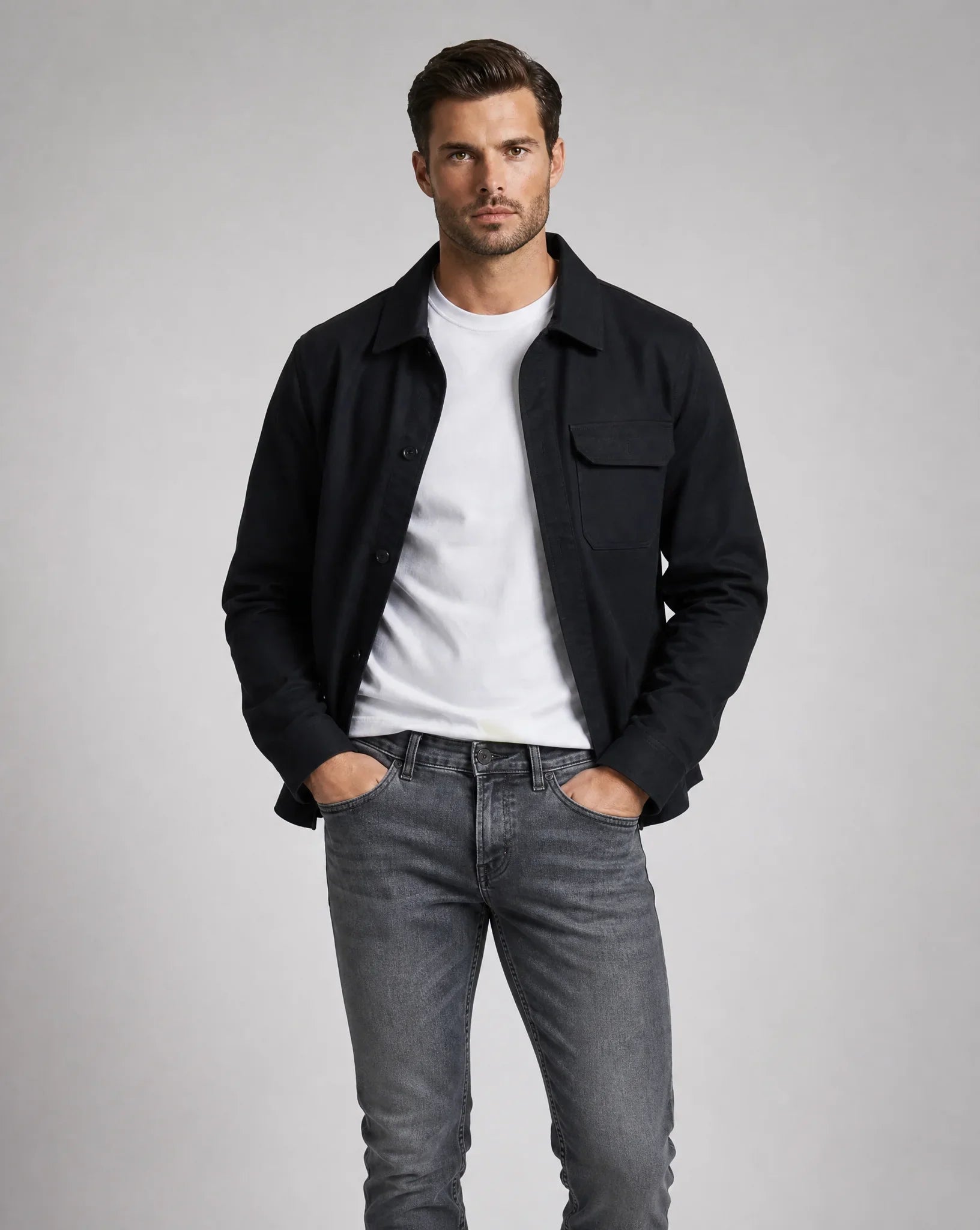 Men's black overshirt jacket featuring chest pockets, button front, lightweight construction and versatile smart-casual styling by ILYNORA