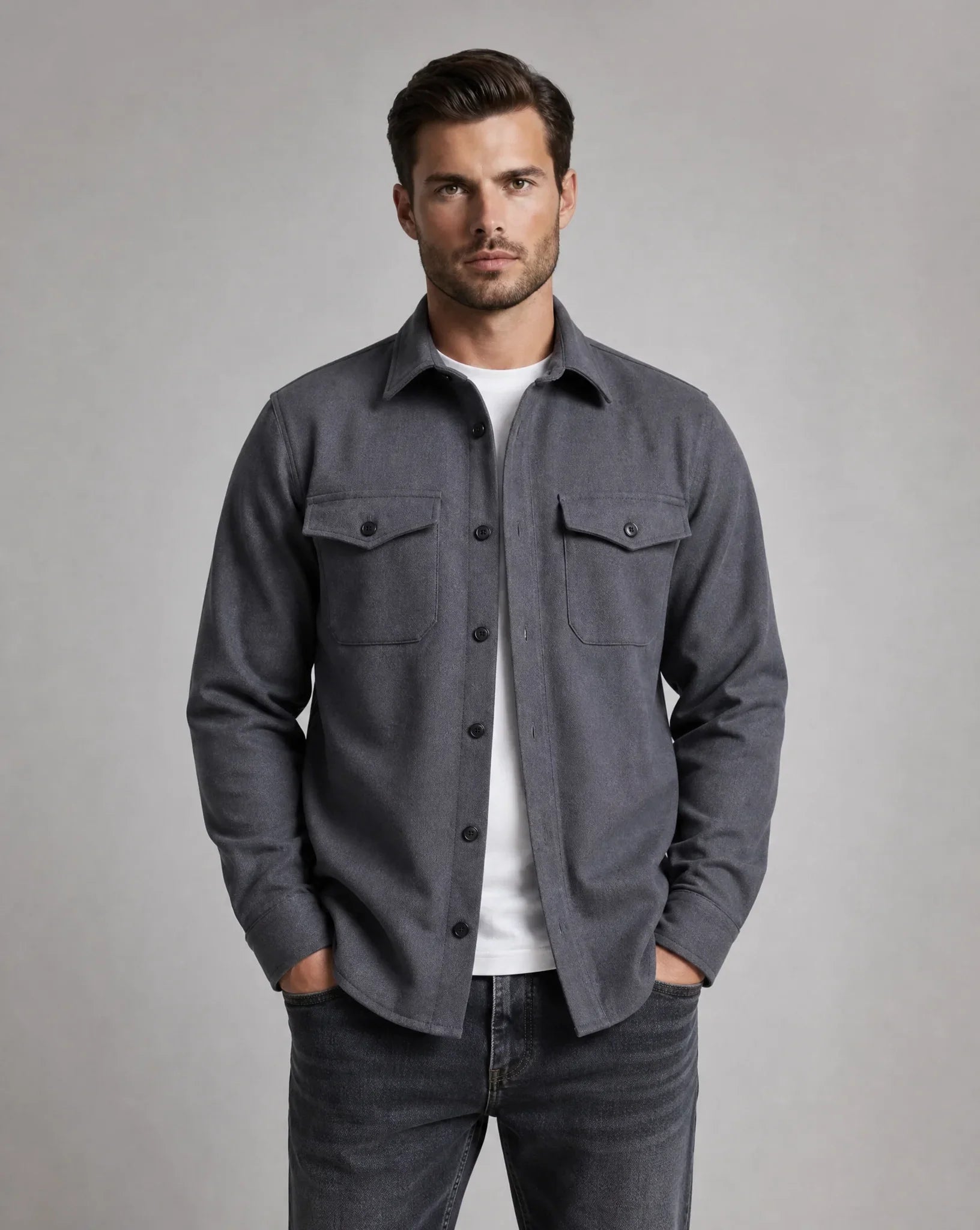 Men's dark grey overshirt jacket with chest pockets, button closure, lightweight fabric and modern relaxed fit by ILYNORA