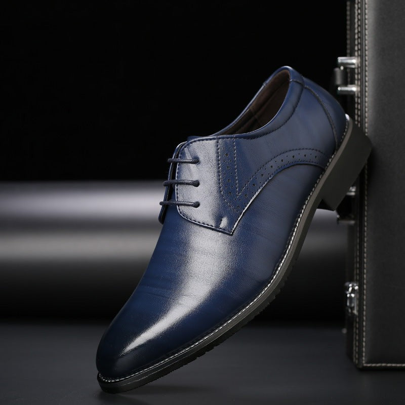 Navy leather men's Derby shoe featuring lace-up front and brogue accents